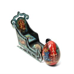 Modern  Russian lacquer box decorated with a Winter landscape, another in the form of a Troika, another lacquer box and a lacquer egg.