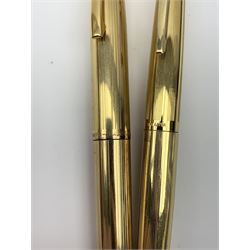 A Sheaffer Imperial Triumph fountain pen, the electroplated body with vertical band decoration, and nib marked 14K 585, together with a further Sheaffer fountain pen, with similarly decorated electroplated body, and nib marked 14K, in unassociated case. 