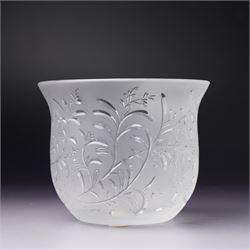 Three Lalique frosted glass tea light holders, decorated with the coriander and basil patterns, and another with trailing leaves, marked Lalique France to base, H7.5cm