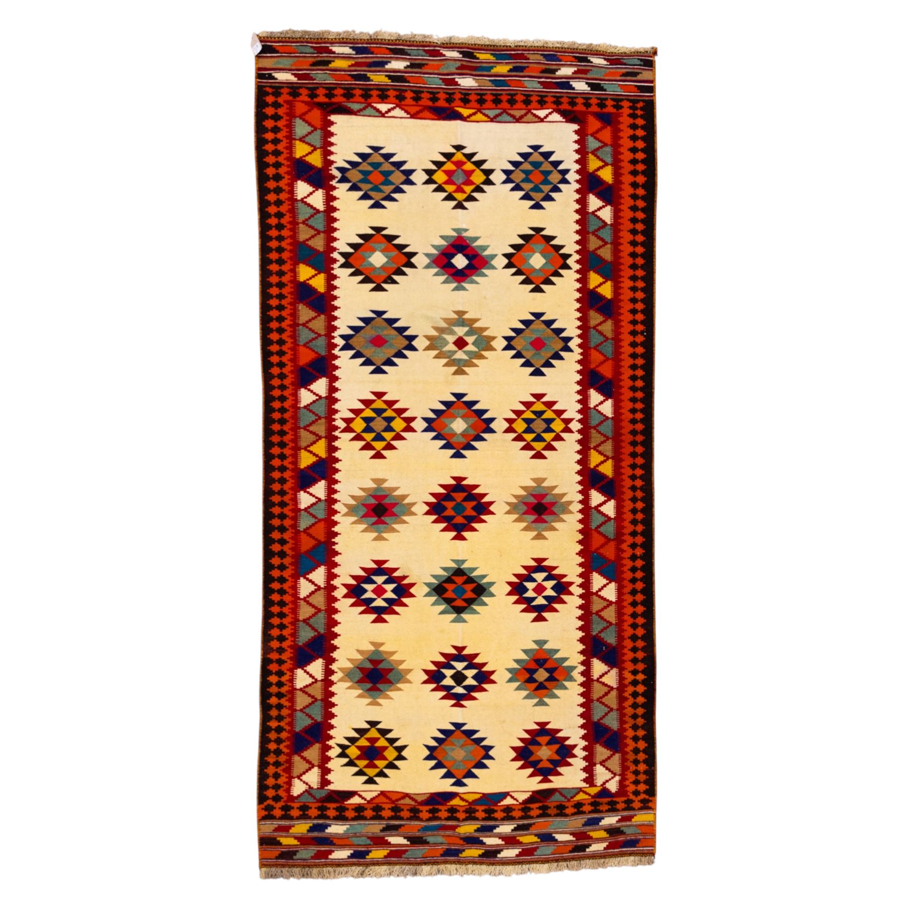 South West Persian Qashqai flatweave kilim, ivory field decorated with rows of multicoloured stepped diamond medallions composed of angular geometric motifs, enclosed by bold polychrome borders of triangular devices and stylized geometric, ornamentation, with fringe ends 
