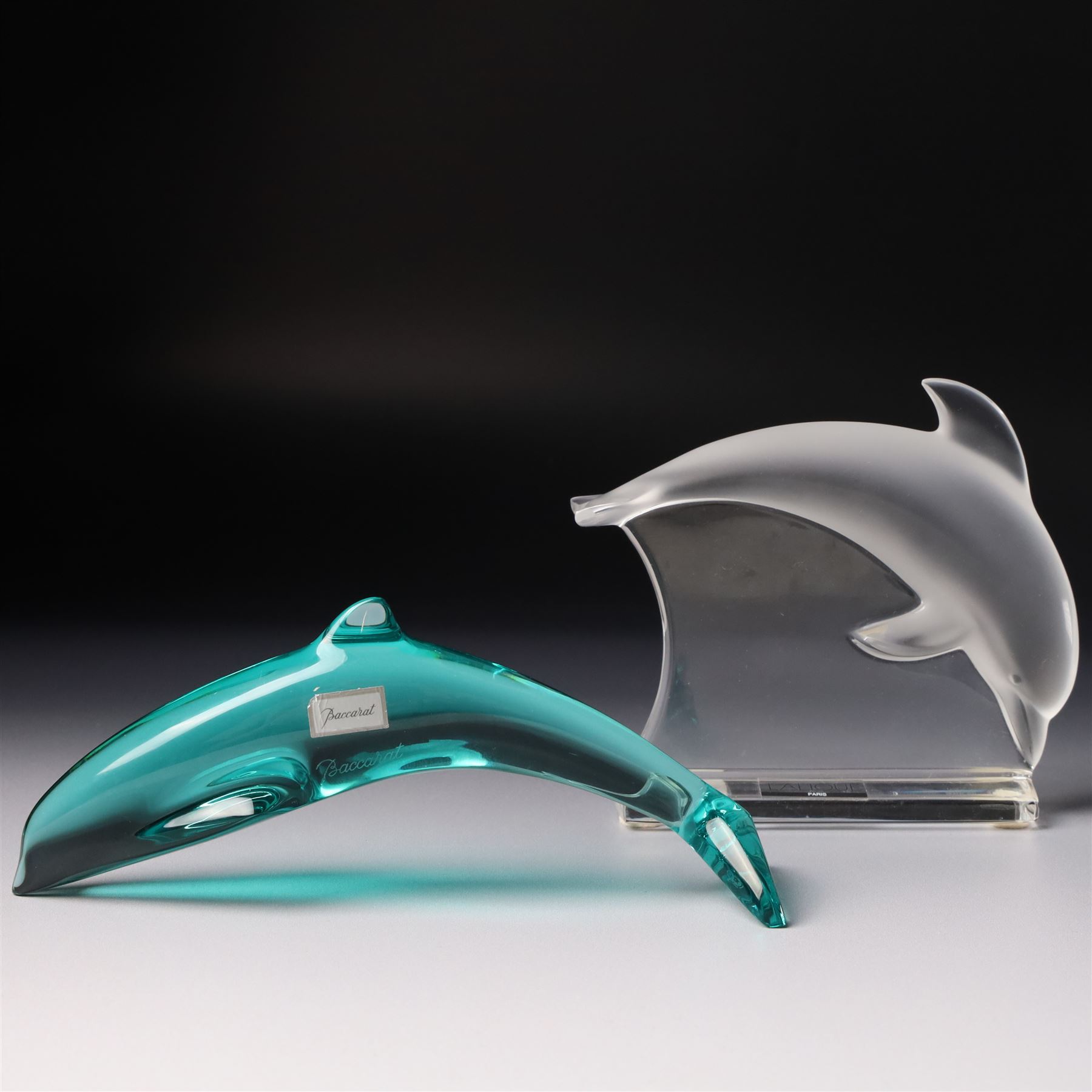 Lalique clear and frosted glass dolphin, label to base W12cm, boxed and a Baccarat blue glass dolphin W16cm  in Mappin & Webb box