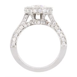 18ct white gold single stone round brilliant cut diamond ring, with pave set diamond surround, gallery and shoulders, principle diamond approx 1.20 carat