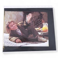 Collection of signed stills and promotional photographs, mostly Sci-Fi TV and film related, including Andy Serkis, Warwick Davis, James Earl Jones, Leroy James, Leonard Nimoy, Billy West, Robert Vaughn, Shane Rimmer, Ethan Phillips etc, all with certificates of authenticity, contained within dark green album
