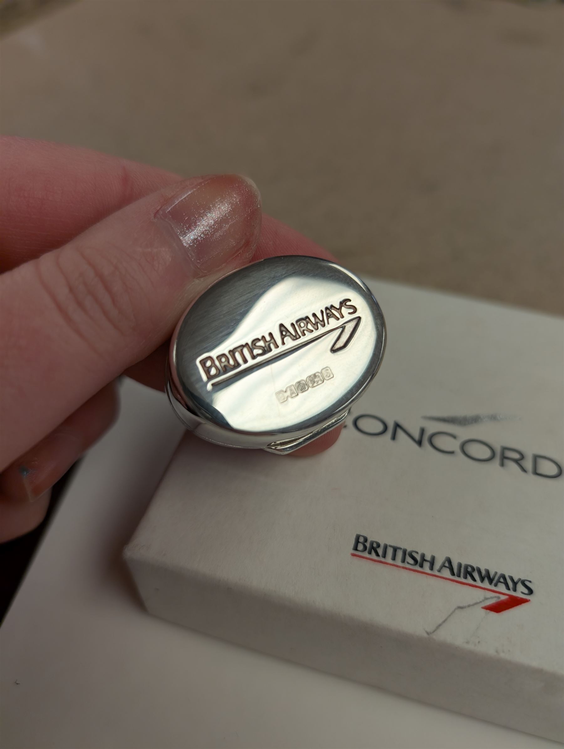 Collection of British Airways Concorde memorabilia, including silver pill box, menus, certificate, etc