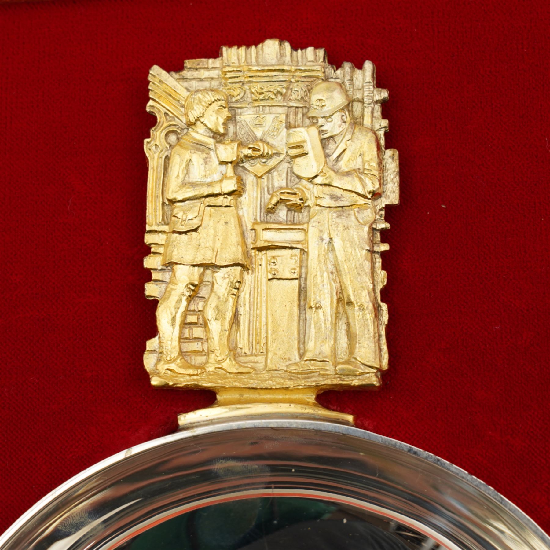 York Minster limited edition silver bowls, commemorating the 500th anniversary of the completion of the Gothic Minster, designed by Hector Miller for Aurum, the gilded handle decorated with stonemasons and blacksmiths working, with planished finish to exterior, no. 326 and 327/1000,  hallmarked Hector Miller, London 1972, D11.5cm, with certificates and original case