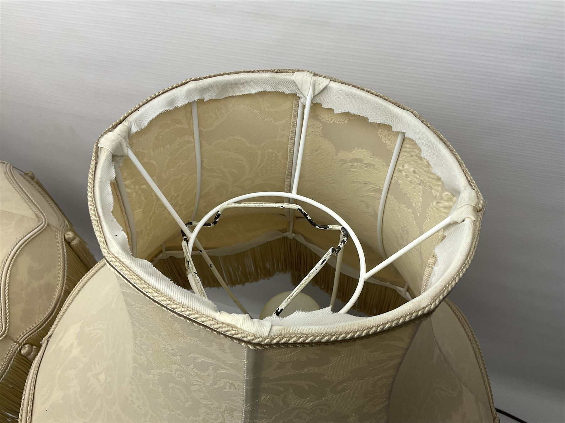 Two Giuseppe Armani figural lamps, the first modelled as an owl perched upon a book, the second modelled as a pair of owls perched upon blackberry branch, each with damask fabric tassel shades, tallest H76cm