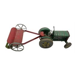 Mettoy tin-plate clockwork tractor and grass cutter with die-cast wheels L37cm; and Marx clockwork walking Mr. Smash Martian H15cm (2)