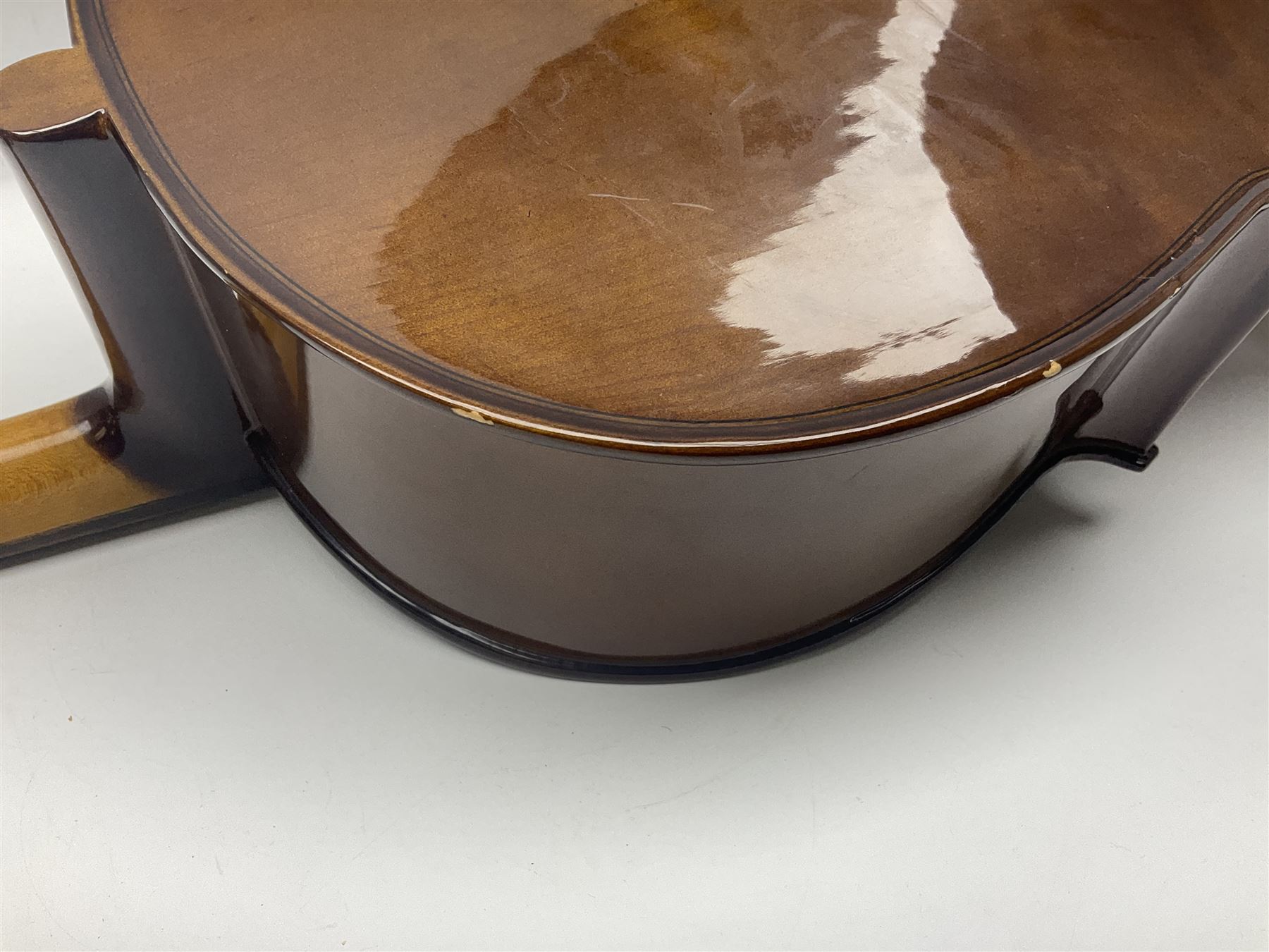 Stentor Student I quarter-size cello with 59.5cm two-piece maple back and ribs and spruce top; bears maker's label with serial no.M076096 L95.5cm overall; in Stentor soft carrying case with bow