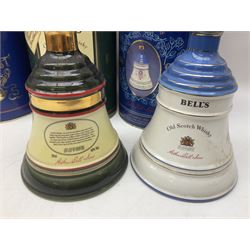 Bells, Scotch whisky, in seven Wade ceramic decanters, comprising two Christmas decanters 1990 and 1991, 60th birthday of Queen Elizabeth II decanter, Golden Wedding anniversary of the Queen and the Duke of Edinburgh decanter, Birth of Princess Beatrice decanter, Birth of Princess Eugenie decanter and Queen's mothers, together with Bells, blended Scotch whiskies, three miniatures in Wade ceramic decanters, various contents and proofs