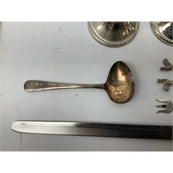 Early 20th century crumb scoop with silver ferrule, hallmarked Sheffield 1981, Hallmarked silver pickle fork with mother of pearl terminal, hallmarked silver twisted stem cocktail picks with cockrells standing upon a globe terminal, together with a quantify of other metalware including cutlery, candle sticks etc