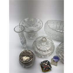 1920s cut glass scent cover with silver and enamel lid, hallmark Cohen and Charles, London, 1920, H6.5cm, together with silver mounted cut glass dressing table pot, the silver cover with scrolling repousse decoration and stamped sterling, plus two cut glass baskets, two pots with lids etc. 