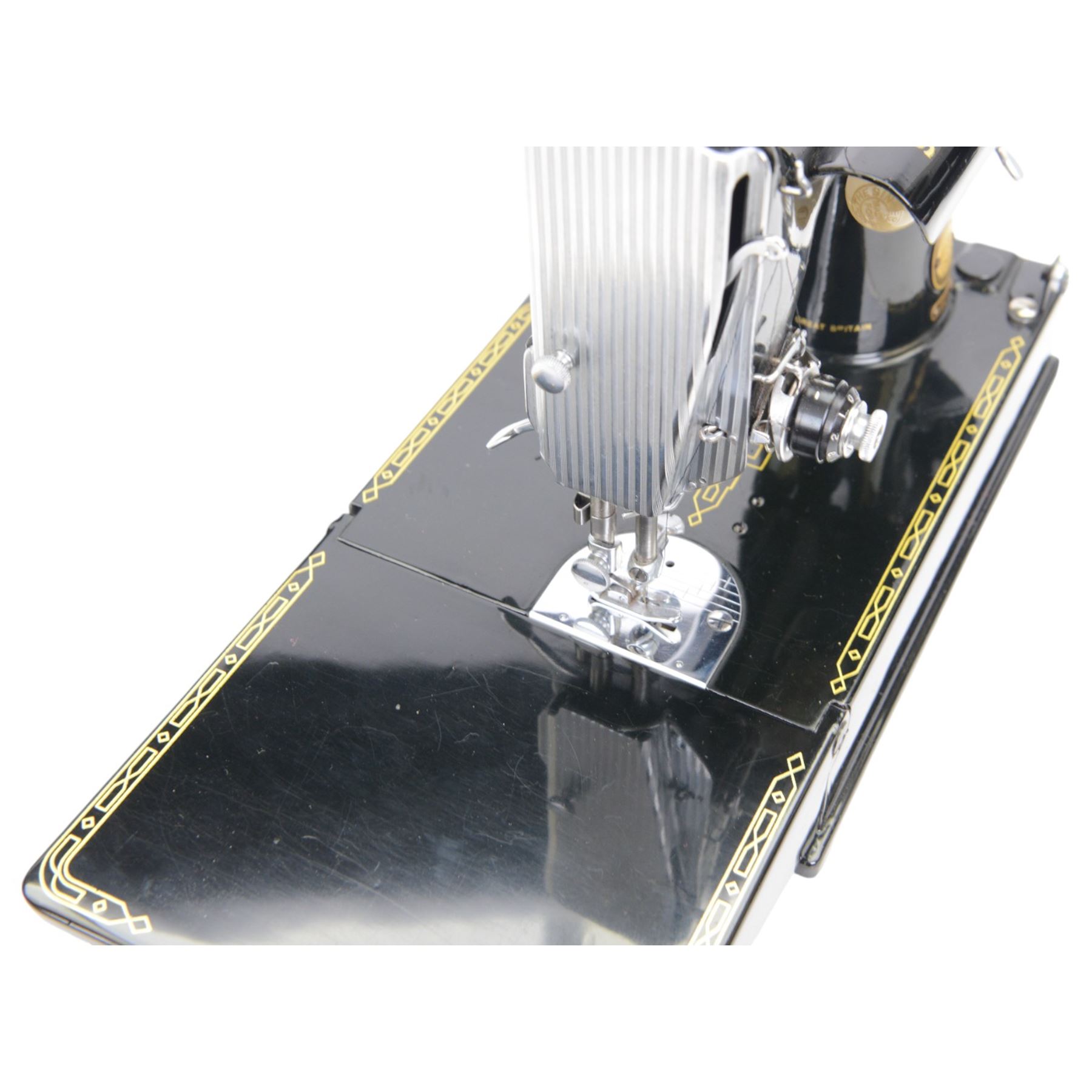 Singer 221K electric sewing machine, with case and accessories