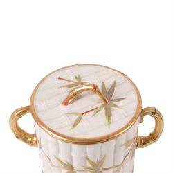 Royal Worcester Blush Ivory twin handled biscuit barrel and lid, in the form of bamboo with gilt highlights, H19cm 