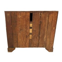 George III mahogany bureau of large proportions, the fall-front enclosing fitted interior with fluted column secret compartments and assorted pigeonholes and correspondence drawers flanking central cupboard, over four graduating cock-beaded drawers with original brass swan-neck handles, raised on bracket feet