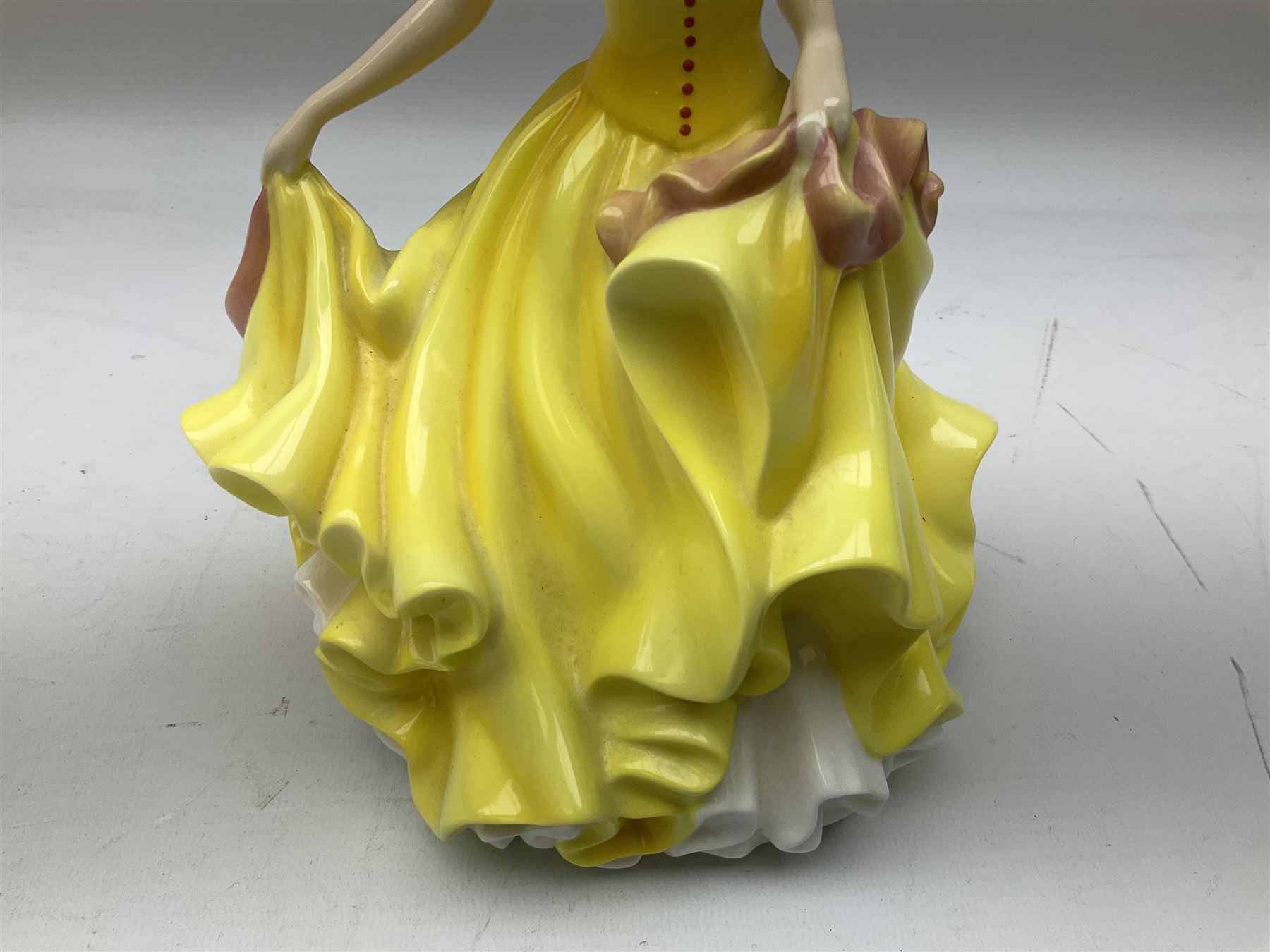 Five Royal Doulton figures from the Pretty Ladies collection, comprising Spring Ball HN5467, Autumn Ball 5465, Summer Ball HN5464, Summer HN5322 and Spring HN5321