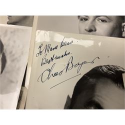 Early 20th century ephemera, to include signed photographs of Charles Boyer and Walter Pidgeon etc, a printed letter from Winston Churchill, two albums and a quantity of transfer books of Players and similar cigarette cards, including Boy Scout and Girl Guide Patrol Signs and Emblems and RAF Badges, a collection of greetings cards and postcards, a photograph album containing black and white photographs of Caius College Cambridge and guides and pamphlets on travelling Switzerland and the UK