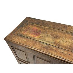 Georgian oak mule chest, moulded rectangular hinged lid over quadruple fielded panel front, the frieze inscribed '17 A Y 57', fitted with two drawers, panelled ends and back, on stile supports