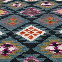 Afghan kilim teal ground runner rug, the field decorated with assorted lozenges with geometric motifs and dark indigo borders, enclosed by a narrow striped guard band