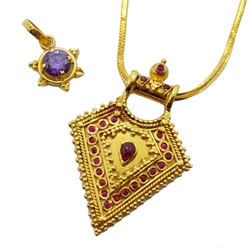  22ct gold pendant set with rubies on chain stamped 750 and an amethyst pendant stamped 15k (2)  