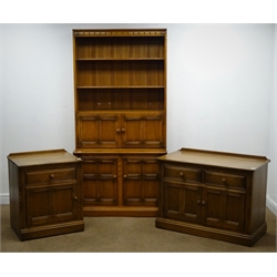  Ercol elm wall unit, raised back, two plate rack shelves above two small and two large cupboard doors, plinth base (W98cm, H197cm, D50cm) a matching two drawer unit (W97cm, H74cm, D51cm) and a single drawer unit (W61cm, H75cm, D50cm)  
