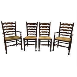 Set eight (6+2) oak dining chairs, high waived ladder back over rush seats, raised on ring turned supports with pad front feet, united by stretchers