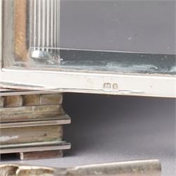 Chas Frodsham -  Miniature carriage clock with platform lever escapement commemorating the marriage of Prince Charles and Lady Diana Spencer, the white dial with an engine turned gilt surround and fleur de lis in silver case with fluted columns and bevelled glass panels H10cm  No.43/1000 London 1981 with key