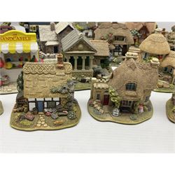 Eighteen Lilliput Lanes, including The Penny Farthing, The Pigsty, Borrowdale School, Fairy Cake Tearoom, An Apple a Day,Ladybird Cottage etc, all with original boxes 