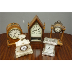  Early 20th century walnut cased dome top mantel clock, 'Ansoina' polished metal alarm clock, 20th century walnut cased portico clock, pointed arched top mantel clock with glazed door and a alabaster mantel clock  