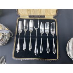 Mother of Pearl handled cutlery, with silver ferrules, comprising six fish knives and forks and six fruit knives and forks, the ferrules hallmarked Yates Brothers, Sheffield 1905, together with silver plated Edwardian three piece tea service and other flatware 