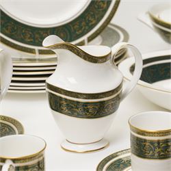 Royal Doulton Vanborough pattern part dinner service, comprising two covered vegetable dishes, open vegetable dish, eight dinner plates, oval serving dish, six soup bowls and two further bowls, eight side plates and eight dessert plates, six coffee cans and saucers, milk jug and a gravy boat and stand