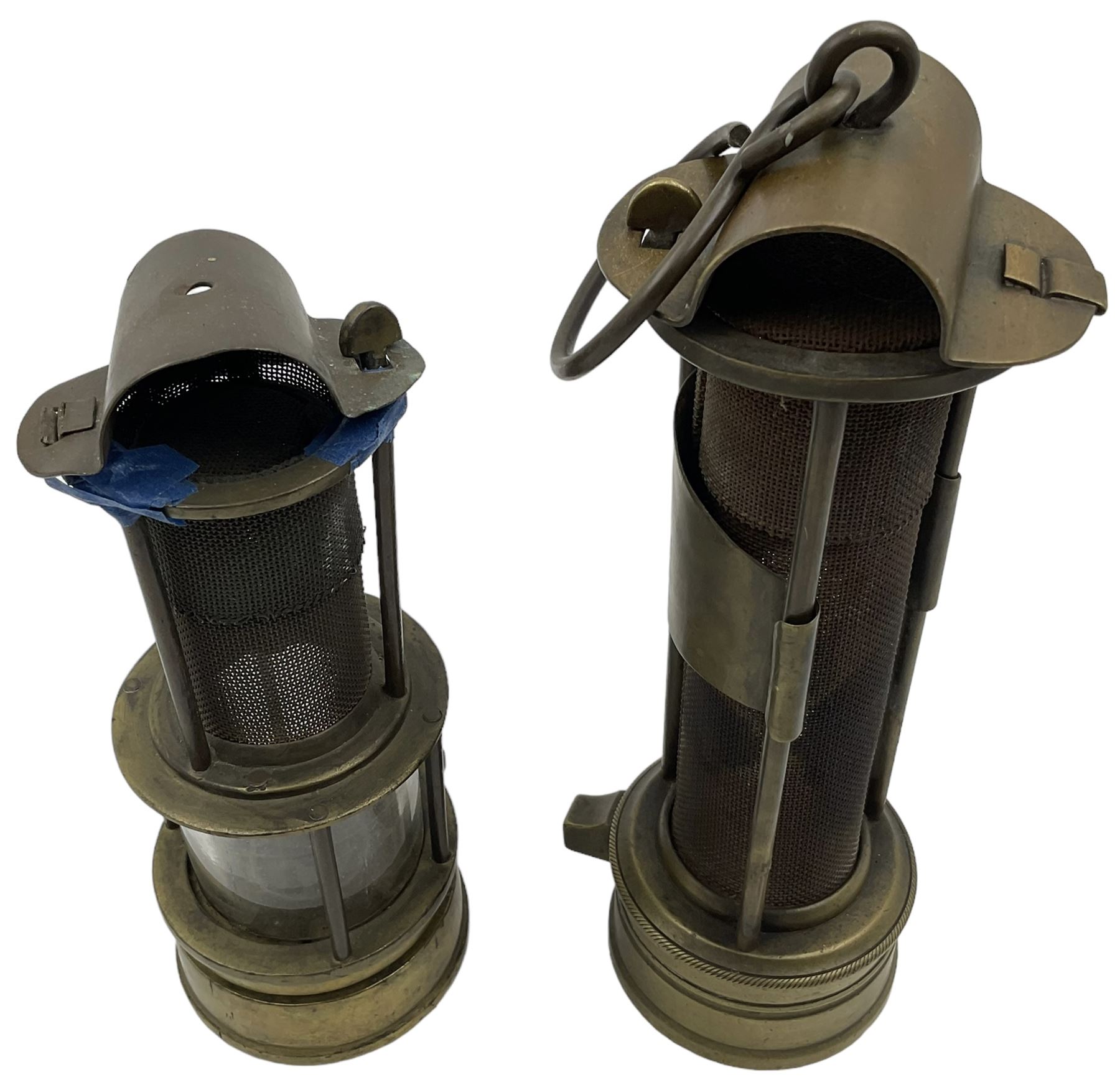 Two mining lamps, including wire mesh three bar example and a wire mess and glass example 