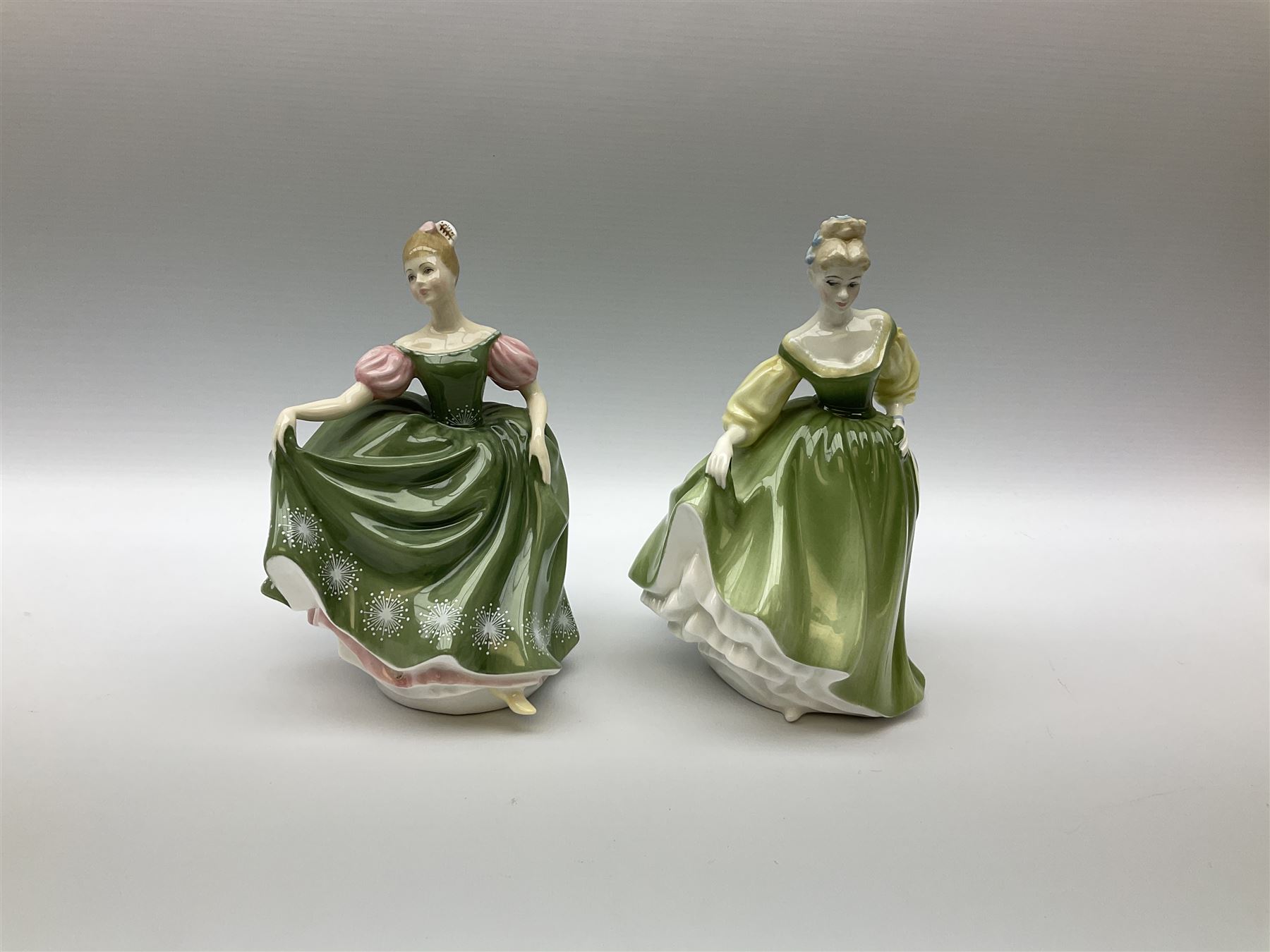 A group of eight Royal Doulton figures, comprising Simone HN2378, Amy HN3854, Fragrance HN2334, Louise HN3207, Adrienne H2304, Michele HN2234, Fine Lady HN2193, Winsome HN2220 and a Coalport figure, Polly. 