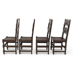 Early 20th century set of seven Jacobean Revival oak chairs, comprising pair of cavers and five chairs, each with carved mask and scroll decoration to the crest and and back rail, plain oak seat, upon turned front legs and block rear legs with conforming stretchers