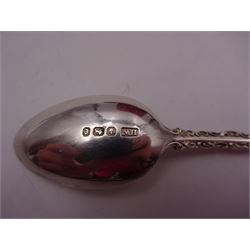 Set of ten Victorian silver coffee spoons, each with shaped scroll design rim, and a matching pair of sugar tongs, hallmarked Lee & Wigfull, Sheffield 1897, in tooled leather burgundy velvet and silk lined fitted case 