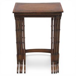 20th century mahogany quartetto nest of tables, the rectangular tops with oval inlay, upon turned knopped supports, united by a curved stretcher, raised upon outswept feet