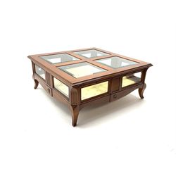 Classical walnut square coffee table with inset glass panels, canted moulding on corners, fabric base and cariole supports 
