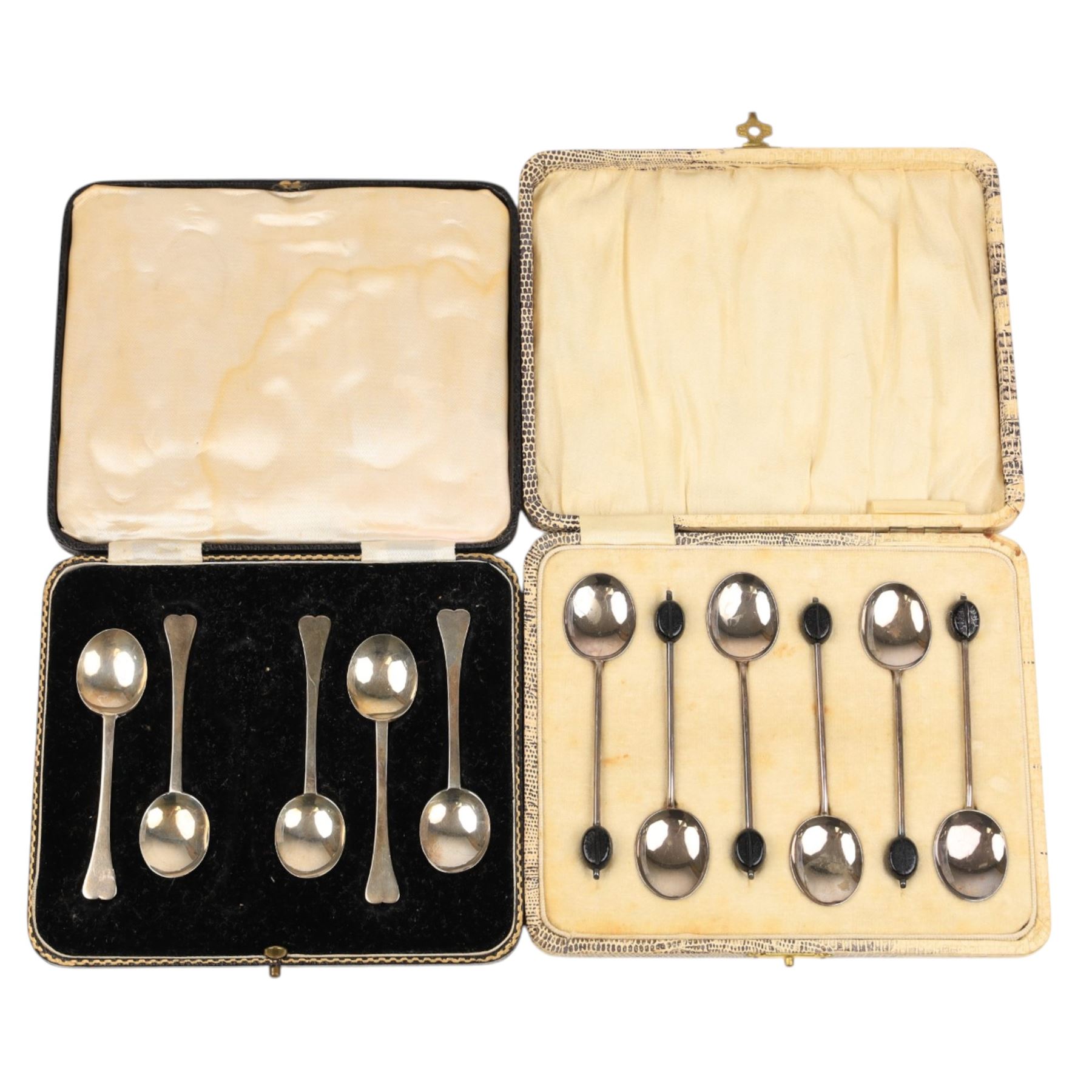 Set of six silver coffee bean spoon and a set of five silver coffee spoons, all hallmarked, in fitted case