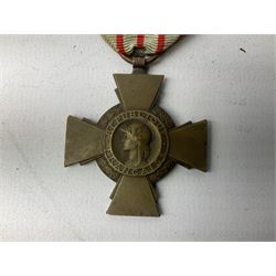 Five continental medals - WW1 Belgian Cross of Fire; WW1 French Croix De Guerre; French Croix De Combattant; French Republic Workers silver merit awarded to L. Mounet 1950; and boxed French Palmes Universitaires Officier d'Academie silver and enamel wreath (5)