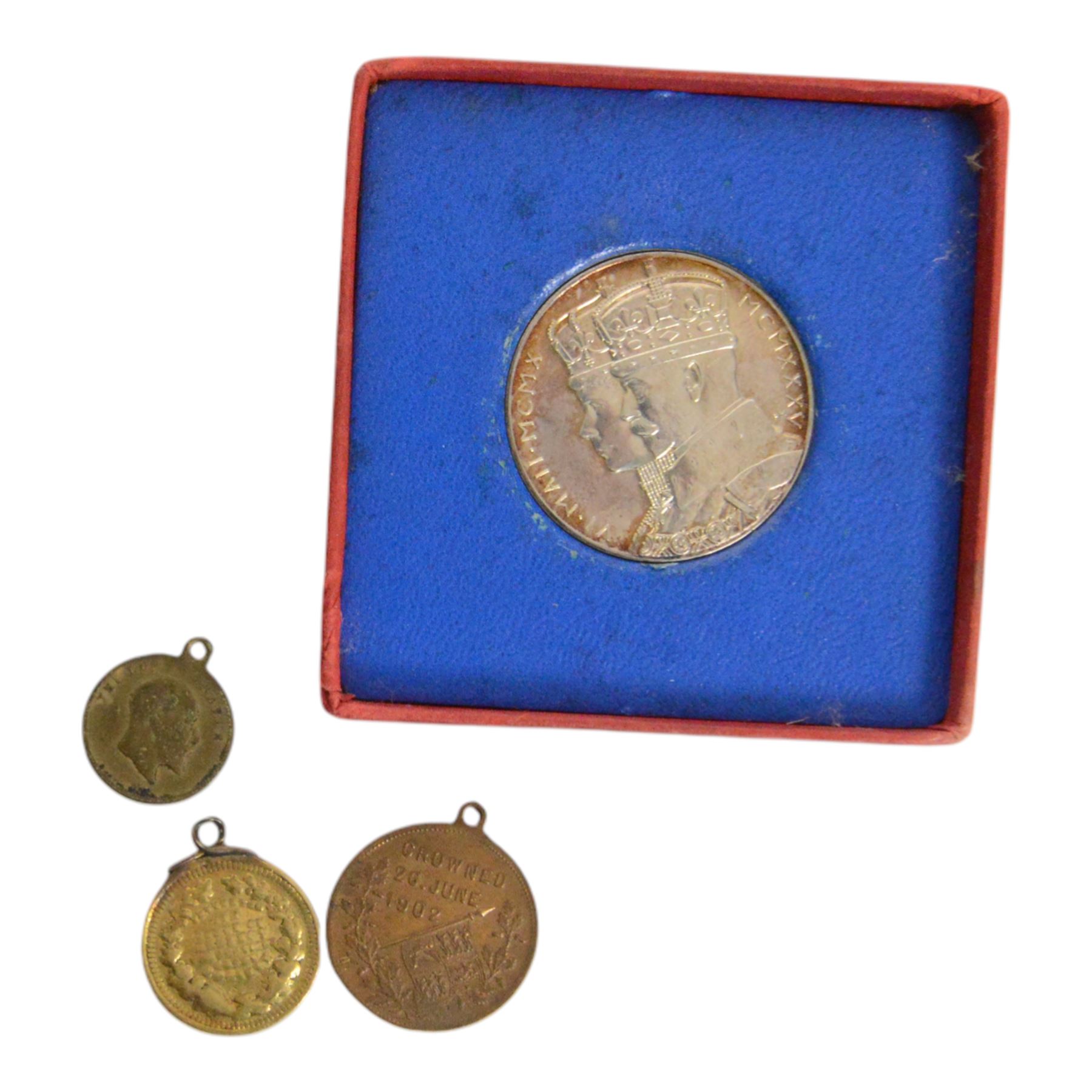 King George V British War Medal, awarded to Sergeant EI Hughes, King George V 1935 silver jubilee medal, in original box, and further commemorative coins and medallions