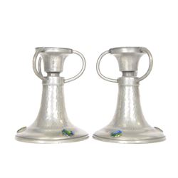 Pair of  Jugendstil hammered pewter candlestick each set with three blue and green enamel ...