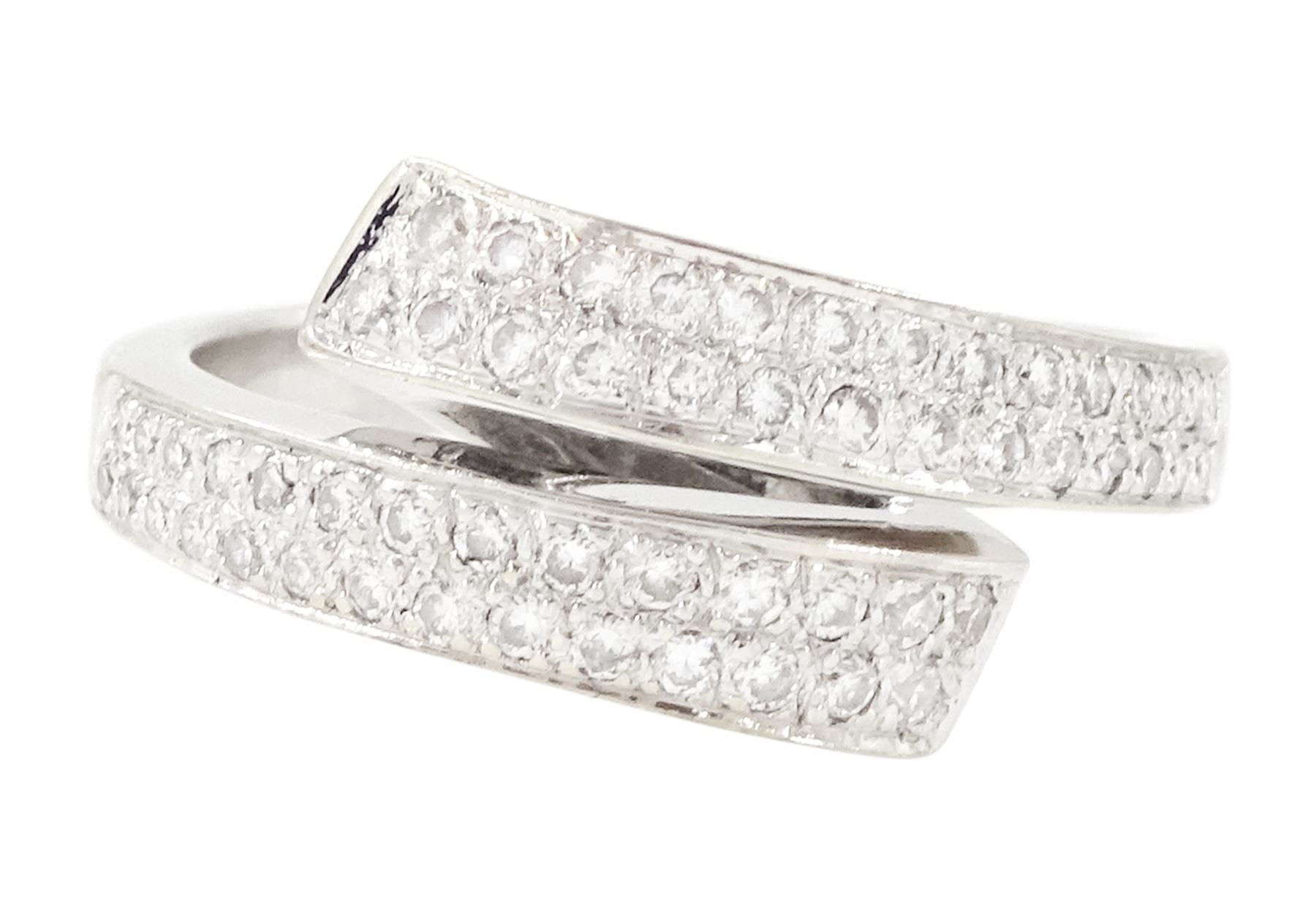 18t white gold diamond crossover ring, two rows of pave set round brilliant cut diamonds, hallmarked, total diamond weight 0.34 carat