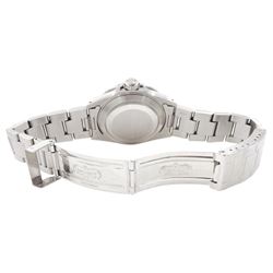 Rolex Oyster Perpetual Submariner Date stainless steel  automatic wristwatch, Ref. 16610, Serial No. L438272, black dial with luminous filled dot hour markers, baton quarters, white outer minute divisions, magnified date aperture at 3, polished Mercedes hands with luminous inserts, on Oyster stainless steel bracelet, with fold-over clasp