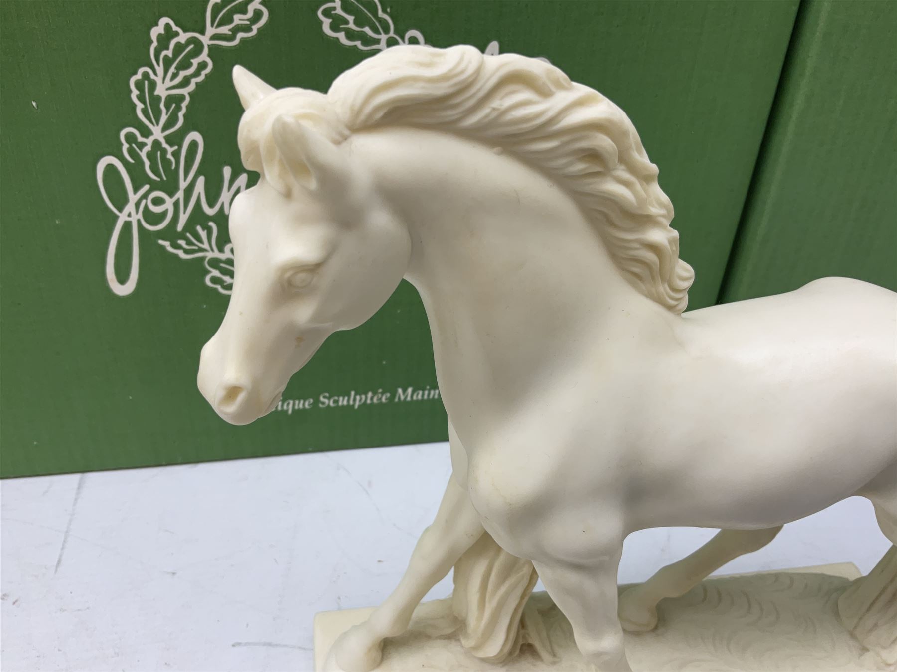 Five Beswick and Royal Doulton horse figures in matt white on black plinths, comprising of  Spirit of Affection no. 2689/2536, Springtime no.2837, Spirit of peace no.2916, Spirit of earth no.2914 and Spirit of the wild no. 183, together with a composite figure of a horse (6)