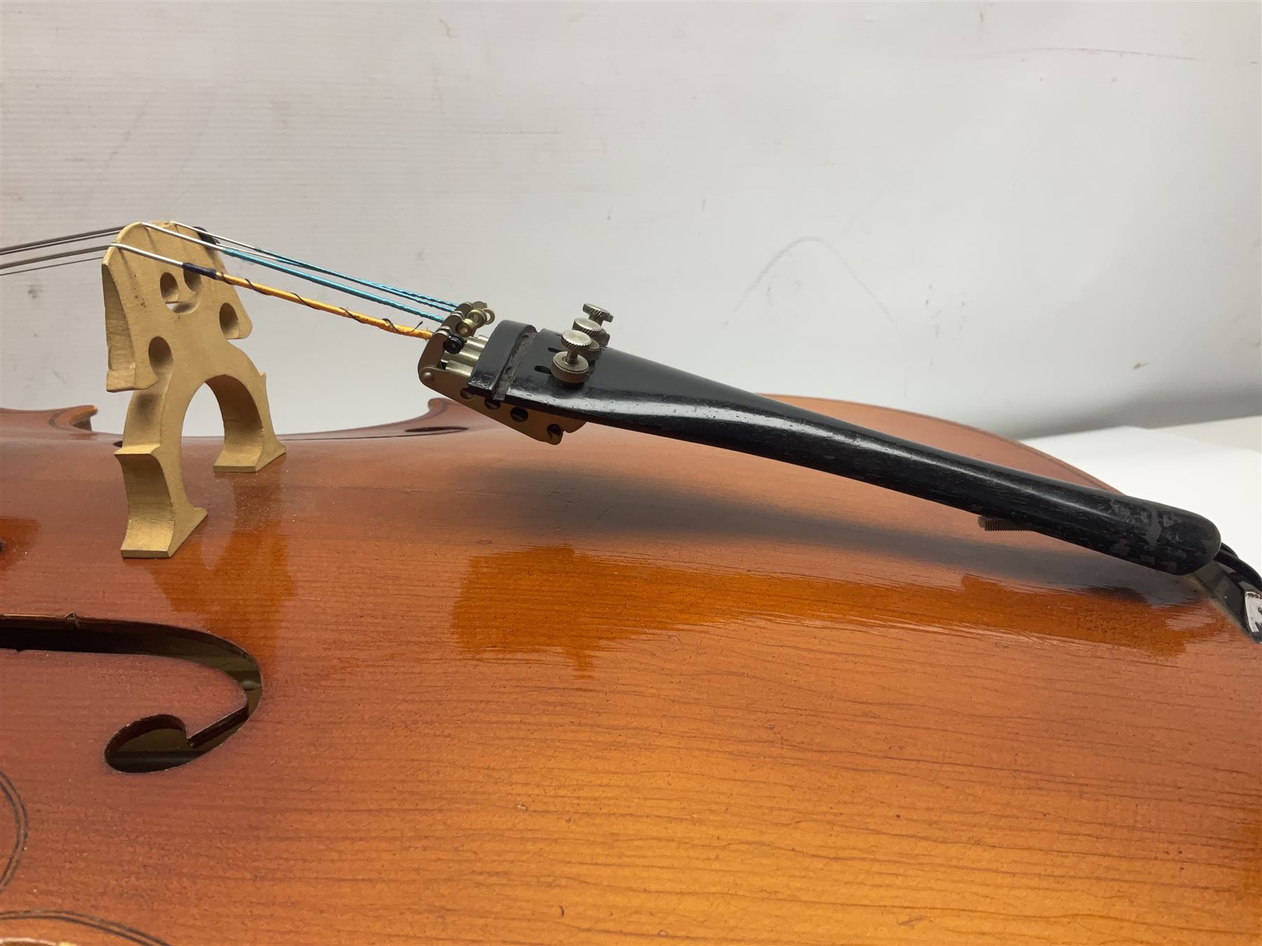 German half-size cello with 69cm two-piece maple back and ribs and spruce top; L112.5cm overall; in soft carrying case with two bows