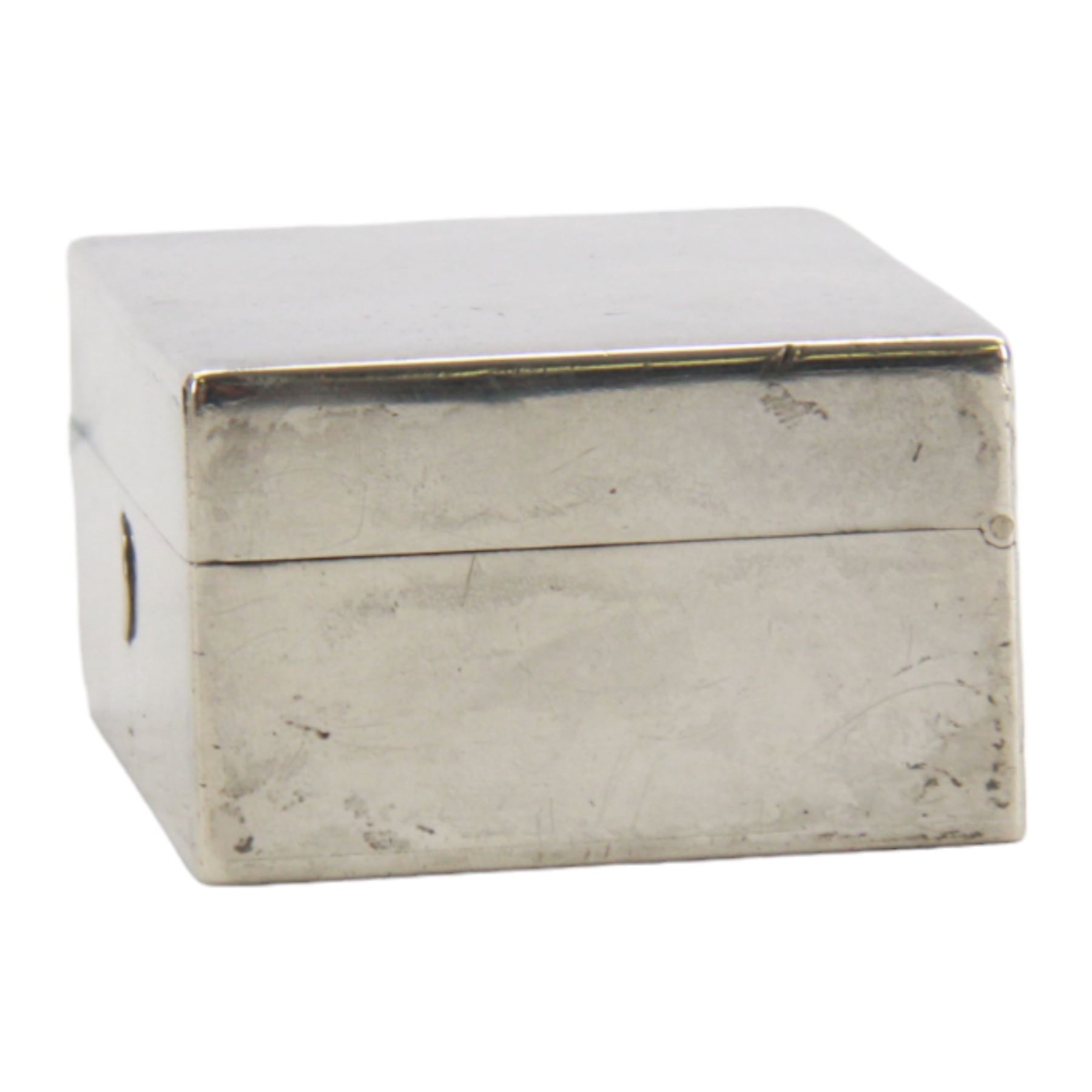 Victorian silver travelling desk compendium, of plain rectangular form, the hinged cover opening to reveal a fitted gilt interior containing inkwell, vesta case, fold down candle holder and seal tray, hallmarked Thomas Johnson I, London 1871, also bearing retailer mark for Asprey Bon Street, H3.5cm W8cm D5.5cm