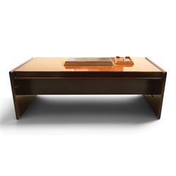 Dyrlund - Santos rosewood office suite, comprising an executive desk and cream leather upholstered swivel chair, the desk with a broad rectangular top with rounded corners, leather writing surface, pen compartments and letter tray, three lockable frieze drawers with fitted interiors above a central kneehole flanked by floating drawer pedestals, the left housing a filing drawer and the right three compartmented drawers, with a full width modesty panel to the reverse, chair raised on a castor base, H 116cm, W 62cm, D 74cm