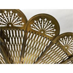 Pierced brass peacock style folding fire screen, with urn finial, H65.5cm