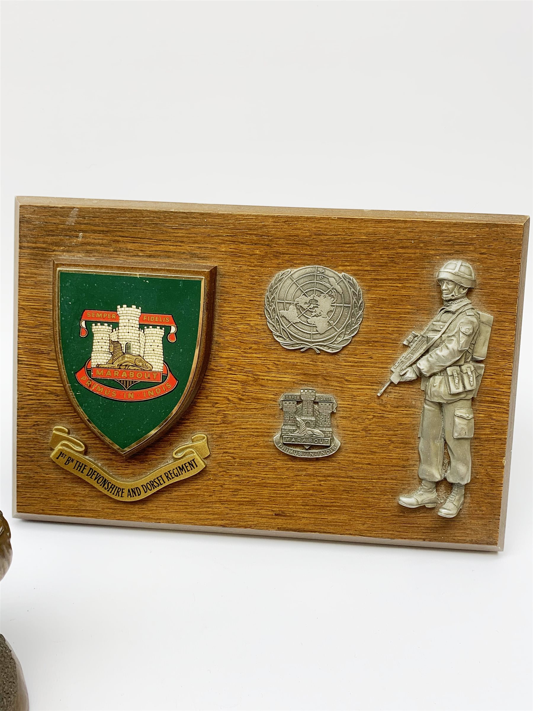 Six Phoenix World Reproductions bronzed figures of soldiers including Special Operations, Law firer, Jungle, radio carrier, Airborne etc, tallest H24cm; and oak Regimental plaque for 1st Bn The Devonshire and Dorset Regiment with strut support (7)