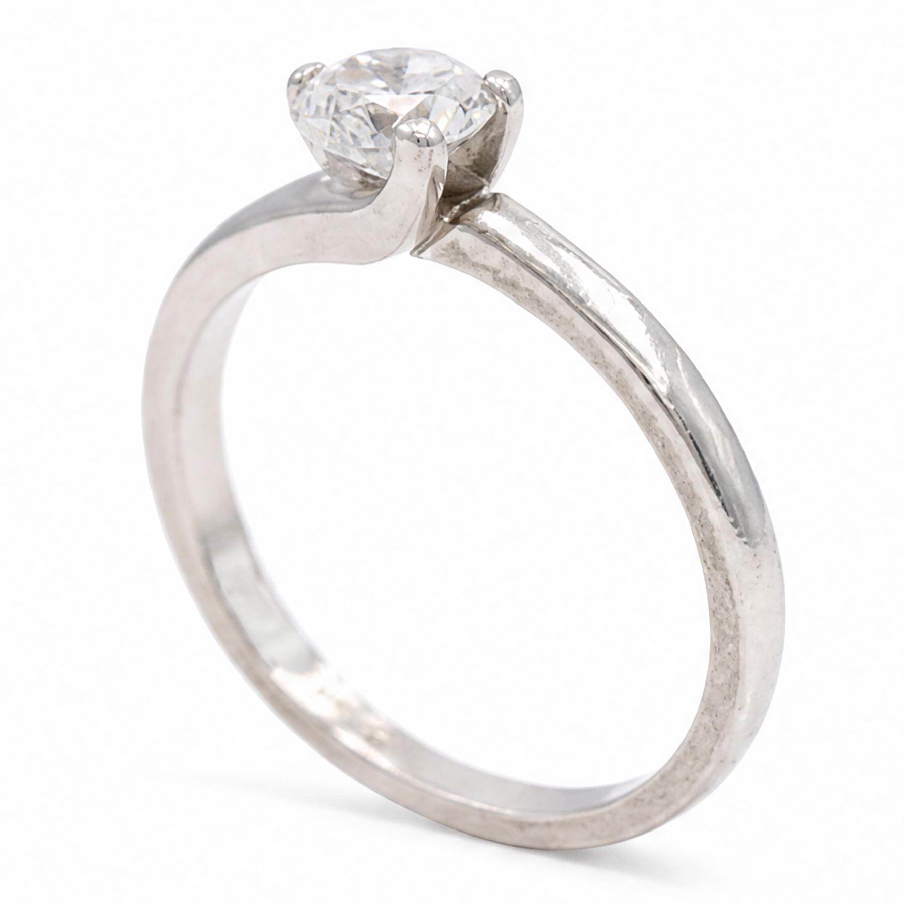 Platinum single stone diamond crossover ring, single round brilliant cut diamond of 0.50 carat, hallmarked