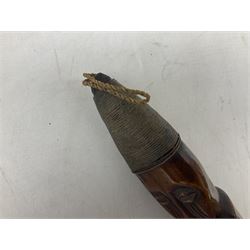 Tribal Art - an African axe, possibly Yoruba, the bone shaft carved as two cord bound stylised figures with iron fan-shaped blade, L35cm overall; and 19th century harpoon or spear head of square section with two long fixing arms on cut-down ash shaft L57cm (2)